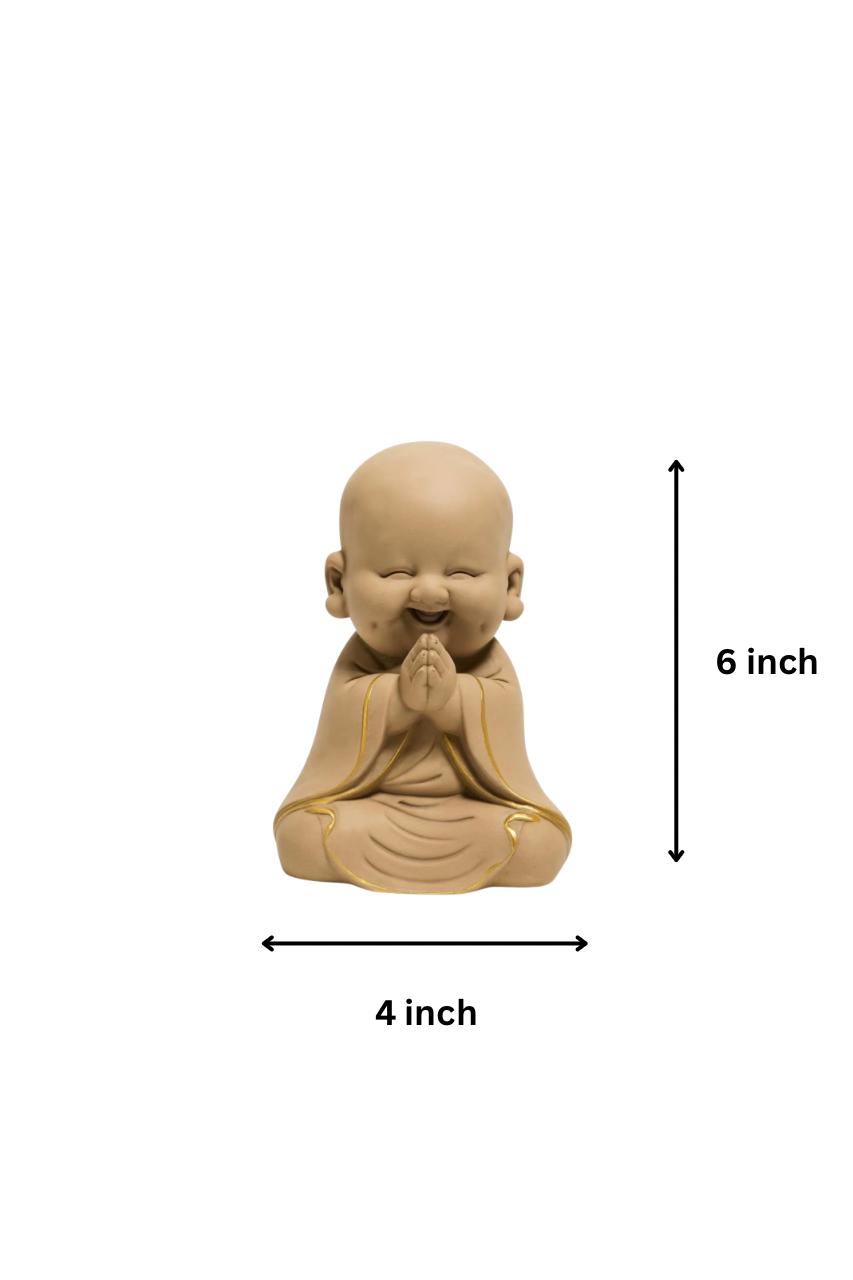 Serene Monk Figurine – Terracotta Calm with Golden Trims