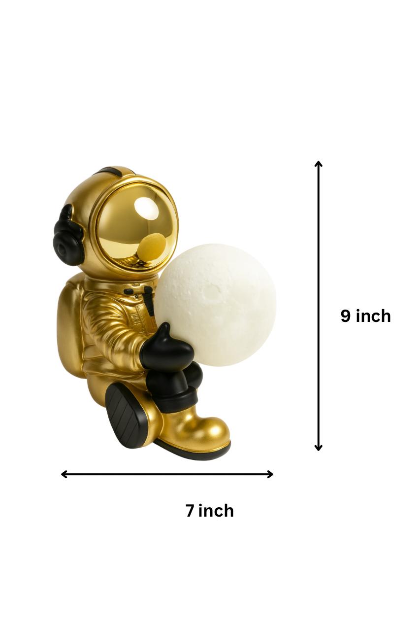 Celestial Gold Astronaut Figurine with Glowing Moon Orb