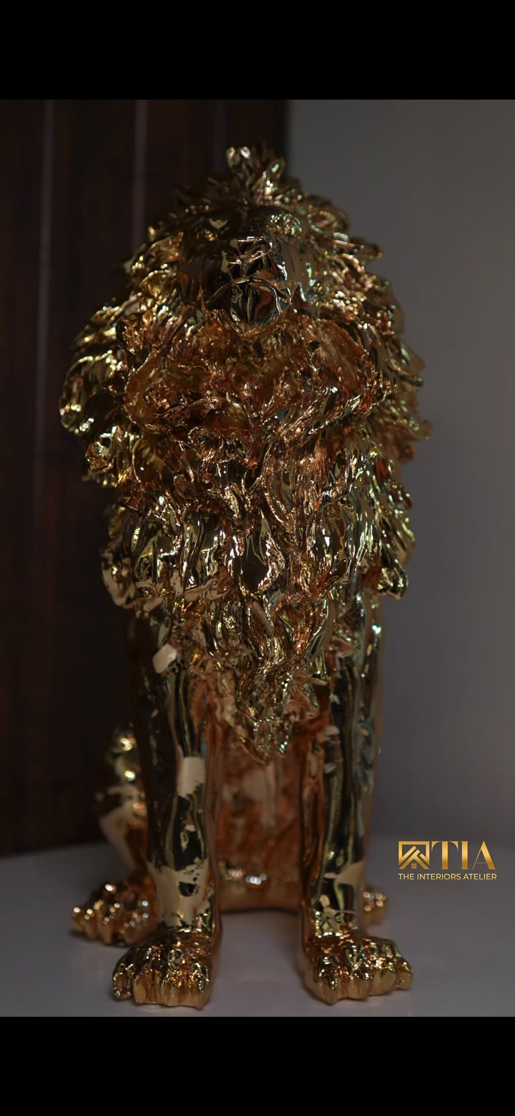 Majestic Golden Lion: Handcrafted Seated Lion Artefact